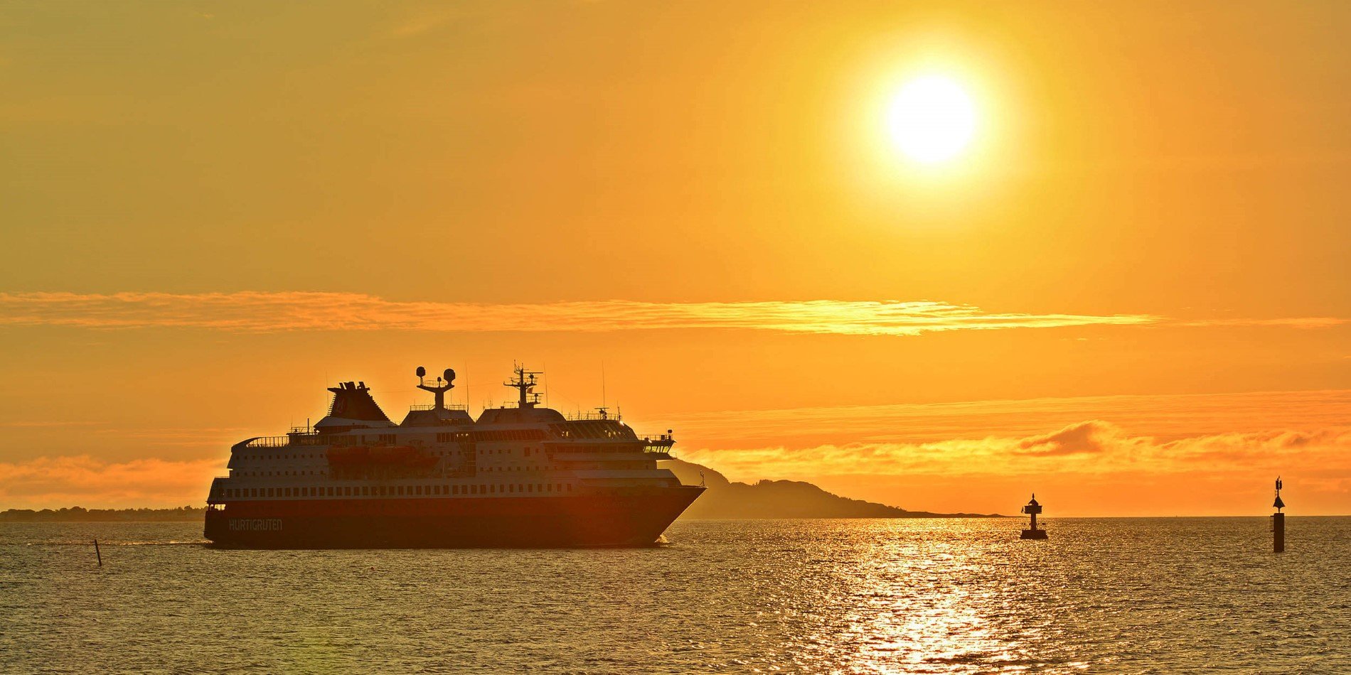MS Polarlys bathing in the midnight sun in Norway 