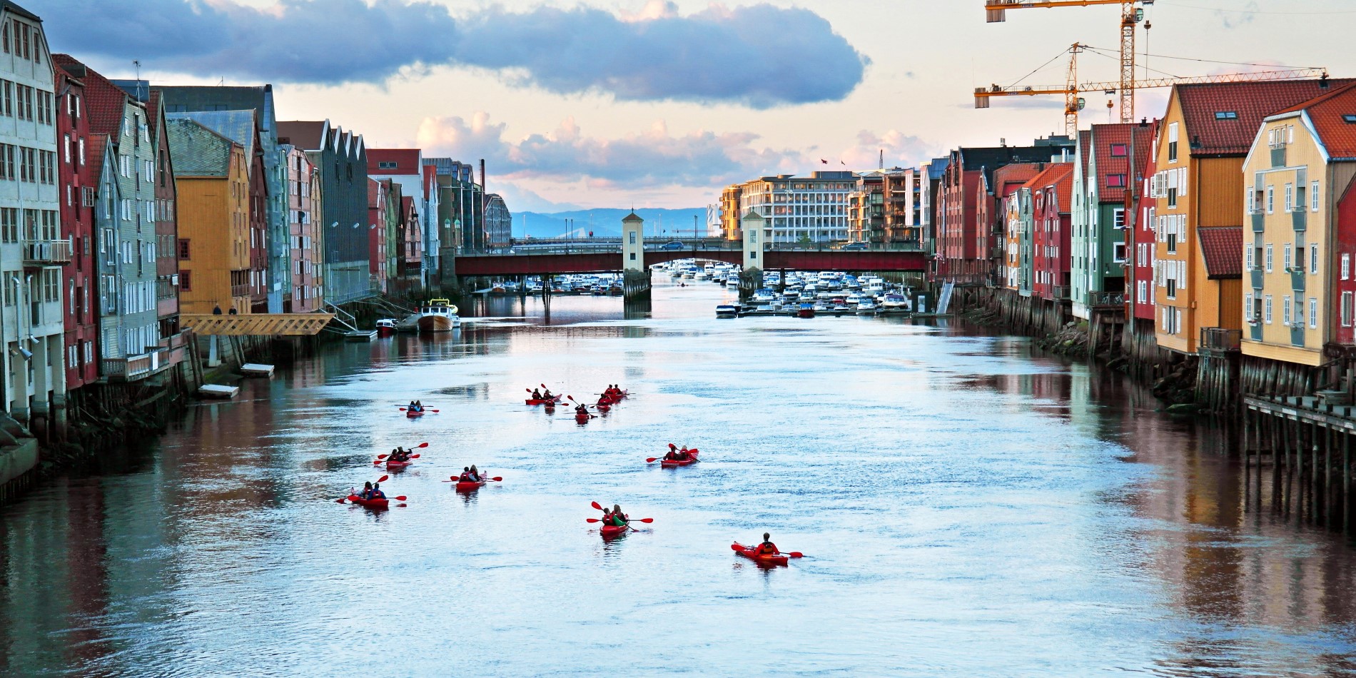 A group of kayaks paddling on the river Nid, in Trondheim, Norway