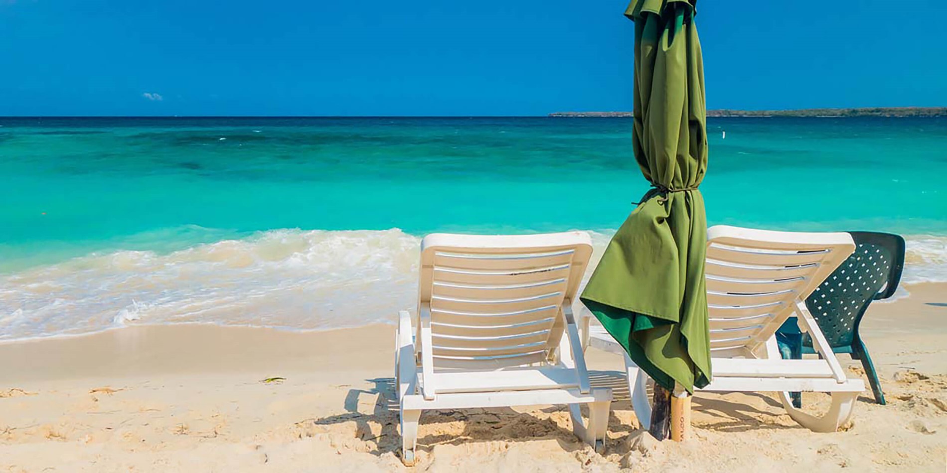 A chair sitting in front of a beach