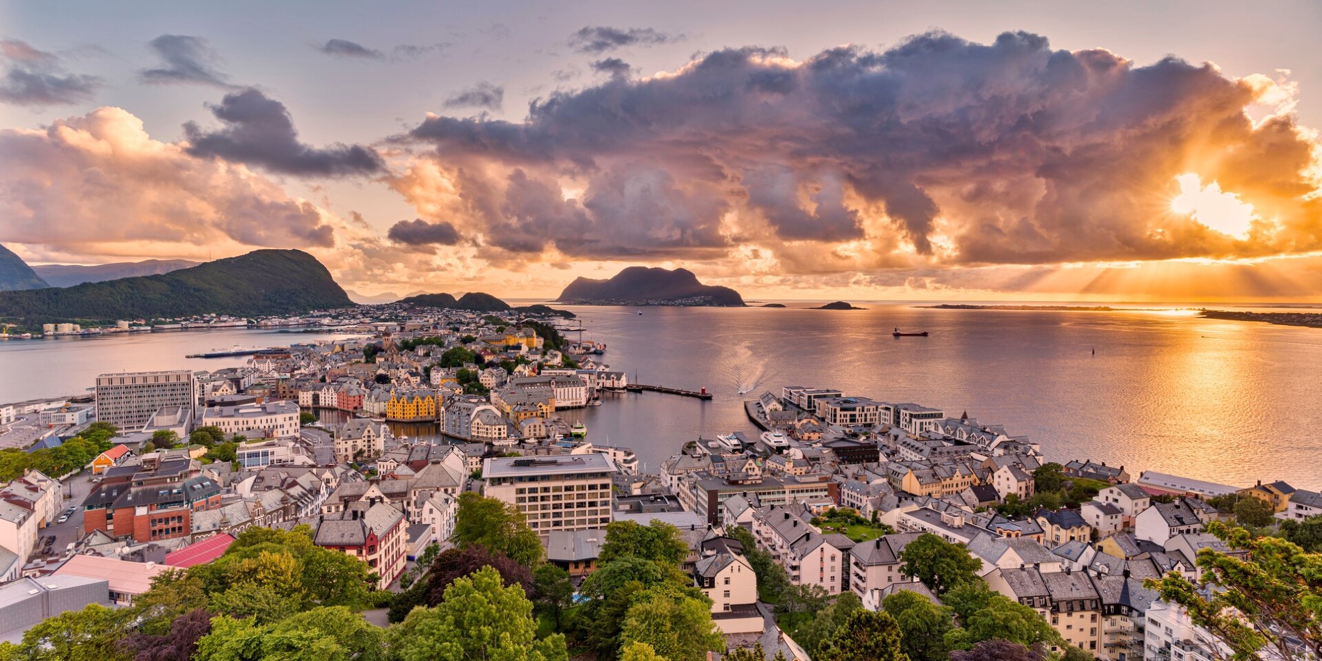 Sunset over the coastal town of Ålesund in Norway in summer