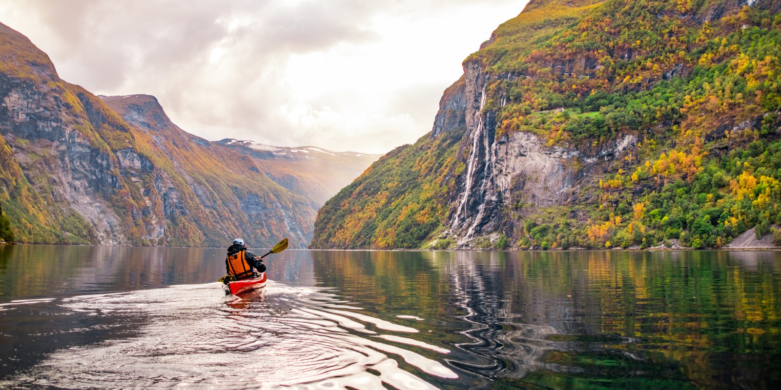 Kayaker in Geirangerfjord Norway